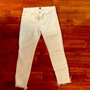 Cute, skinny white jean. Size 29. bit of stretch, Frayed hem, Good condition.